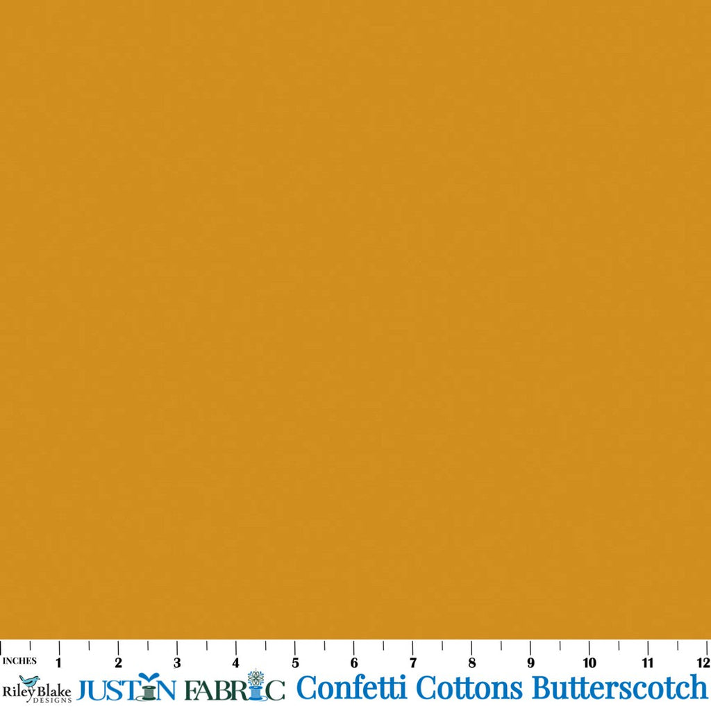 Confetti Cottons Solid Butterscotch Cotton Yardage | Riley Blake Designs soft premium quilt cotton fabric in solid butterscotch gold color
