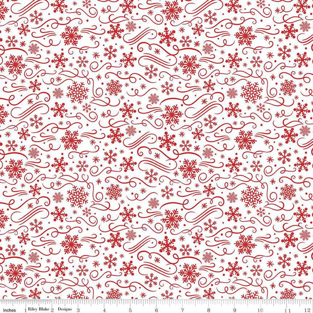 Pristine white fabric adorned with vibrant red snowflakes and elegant swirls, part of The Magic of Christmas collection designed by Lori Whitlock for Riley Blake Designs. The fabric is showcased to highlight its festive pattern.